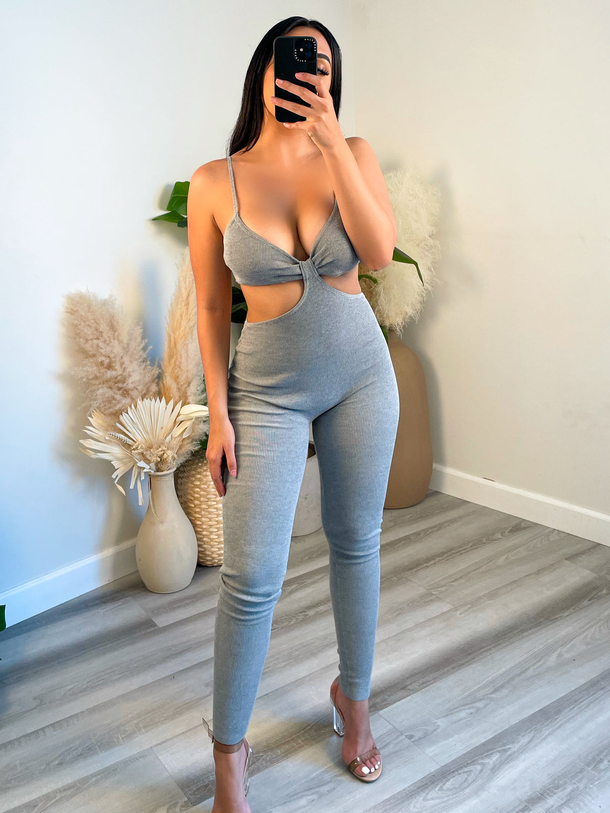 grey jumpsuit, spaghetti straps, adjustable straps, side rib cut outs, ribbed 