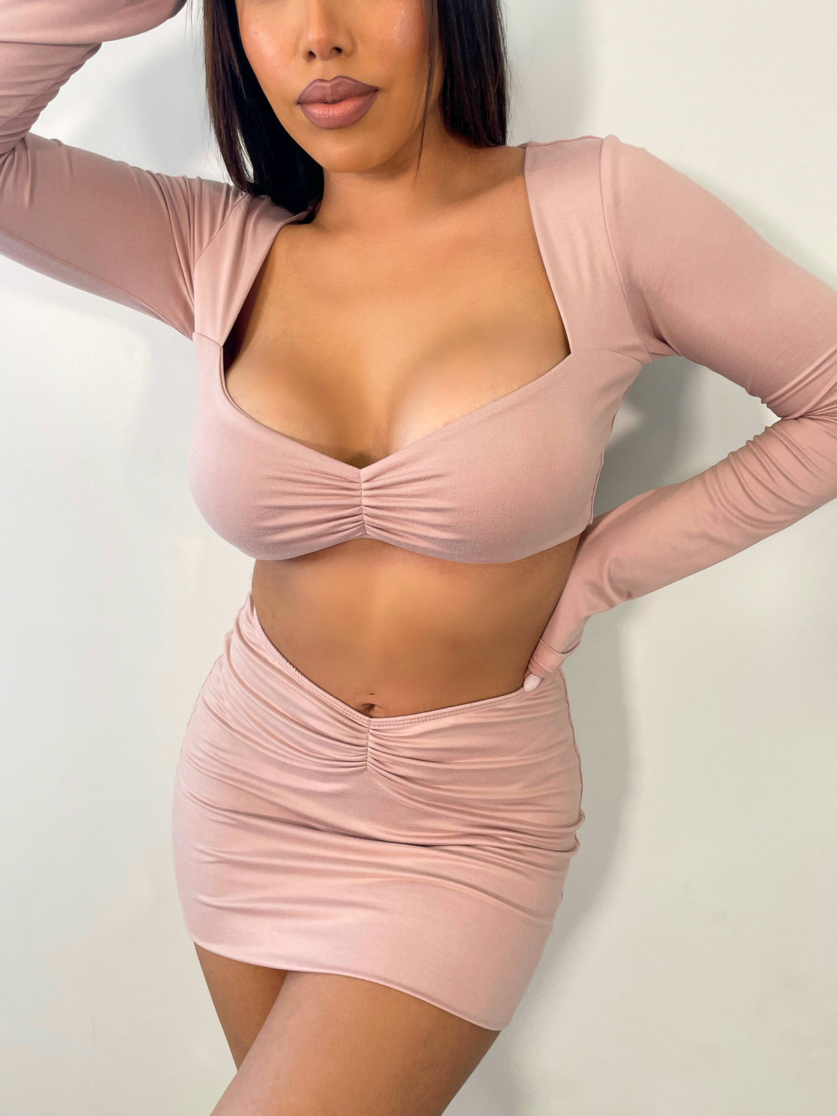 dusty pink 2 piece, long sleeve crop top, ruched front detail, high waisted mini skirt