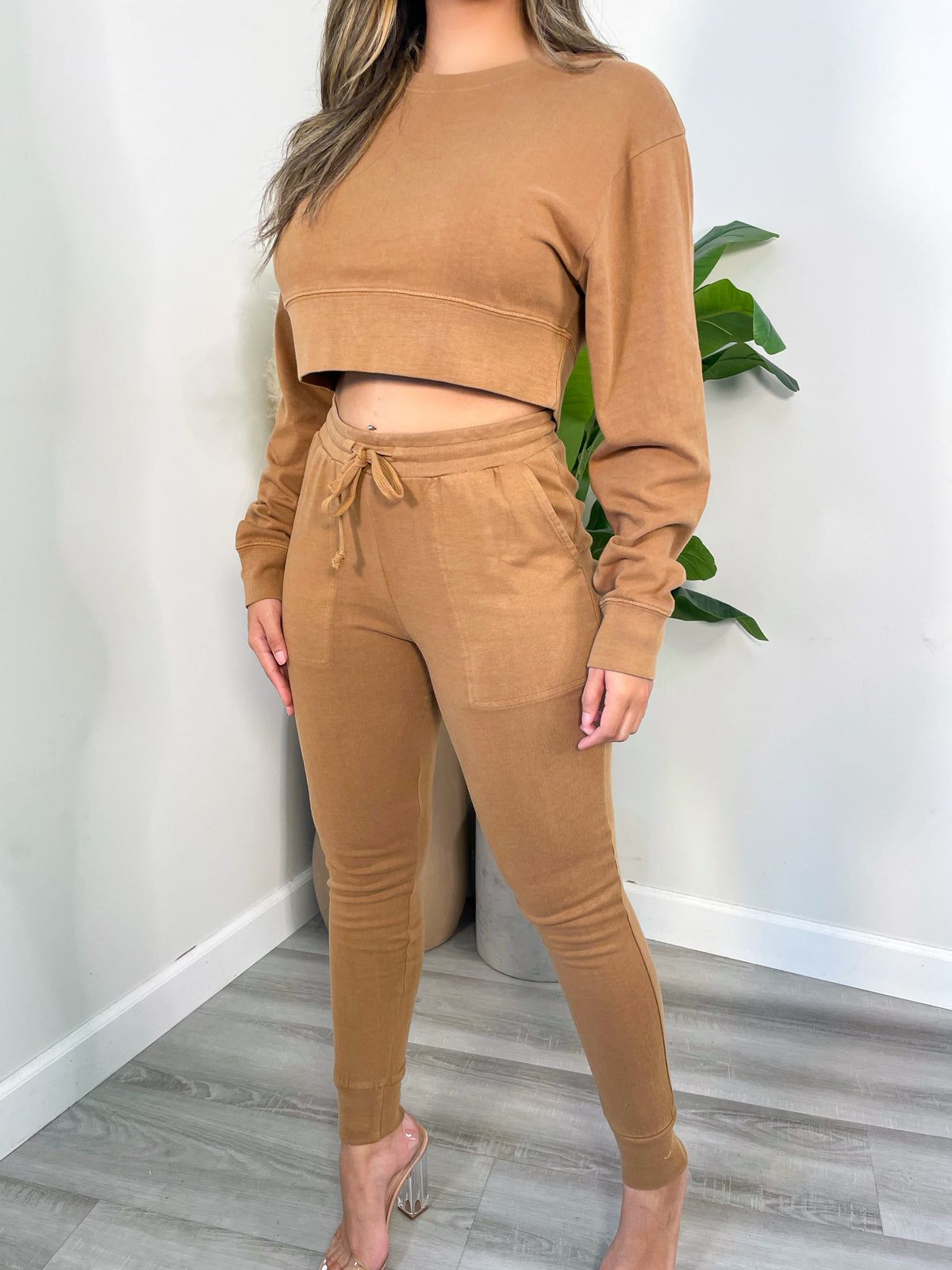 brown 2 piece, long sleeve crop top, high waisted leggings, cuffed ankle/sleeves, drawstring waistband, 2 front pockets