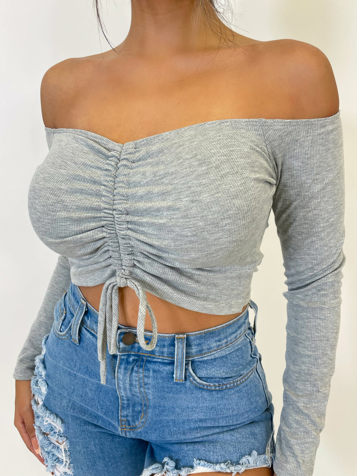 grey crop top, long sleeve, off the shoulder, middle scrunch and tie, ribbed