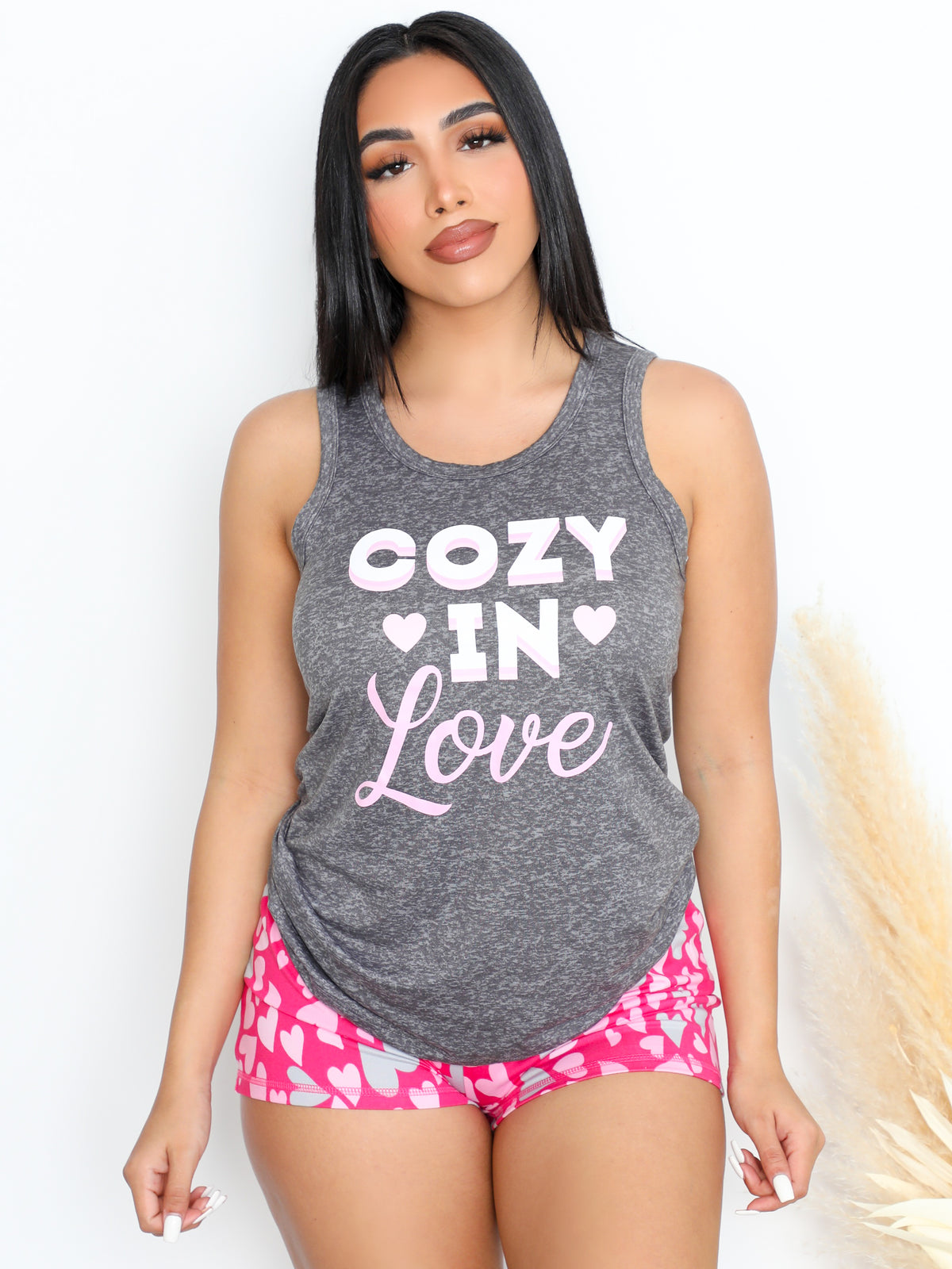 two-piece pajama set, grey graphic tank top, pink high waisted shorts 