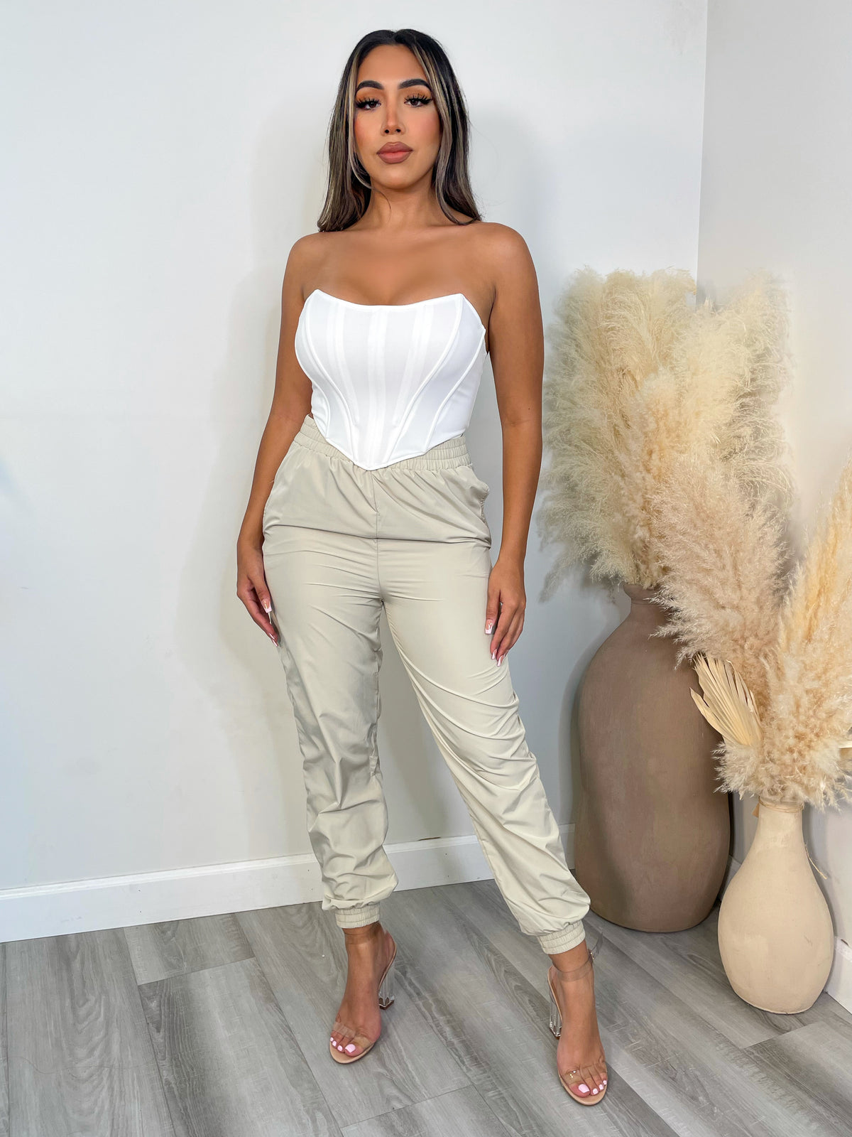  beige jogger, high waisted, elastic waistband, cuffed ankle, 2 front pockets
