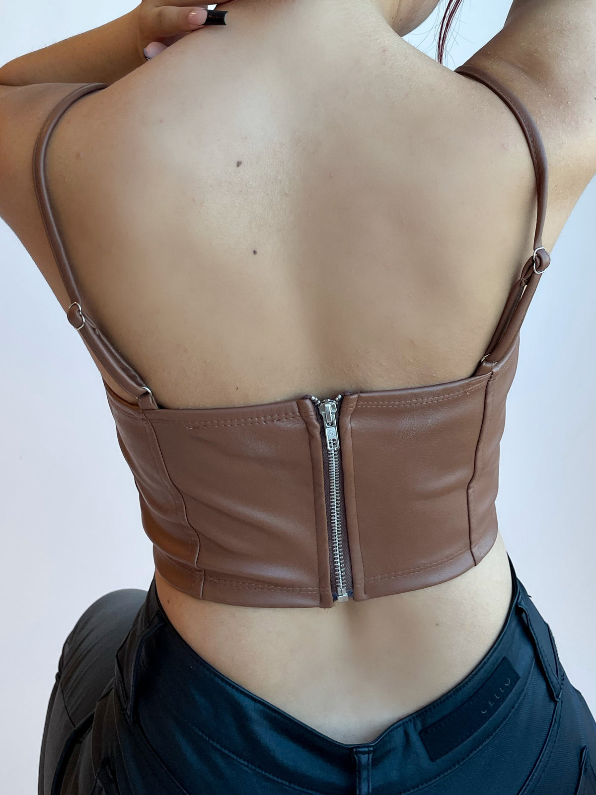 brown faux leather top, crop top, spaghetti straps, adjustable straps, lace up front tie, silver hoops