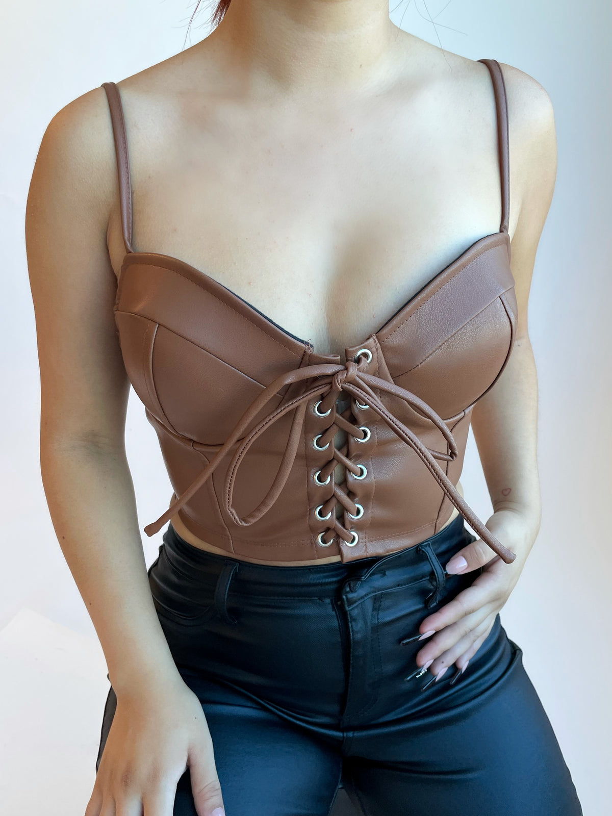brown faux leather top, crop top, spaghetti straps, adjustable straps, lace up front tie, silver hoops