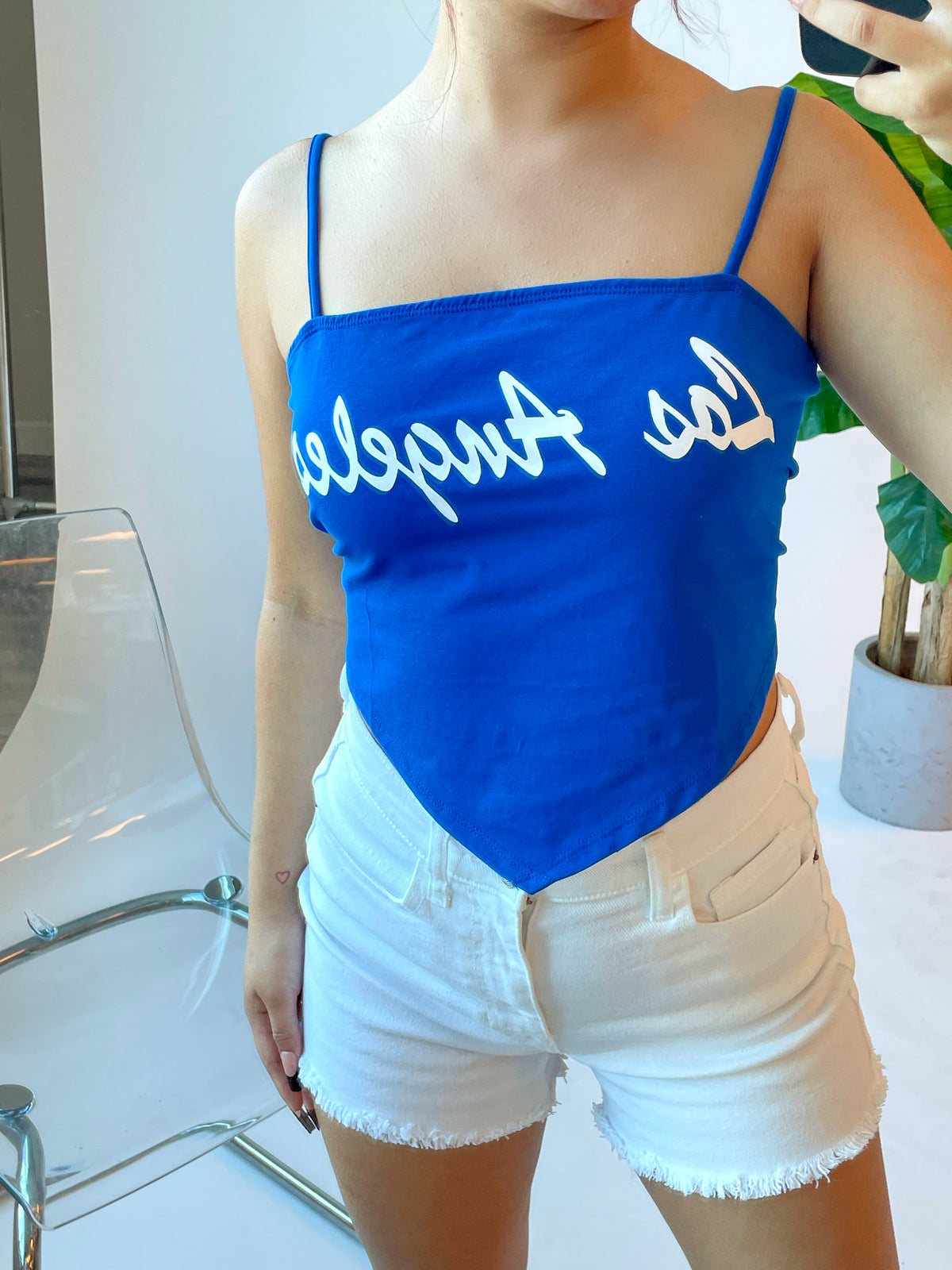 royal blue los angeles top, white font, spaghetti strap, adjustable straps, self tie back, triangle cut out