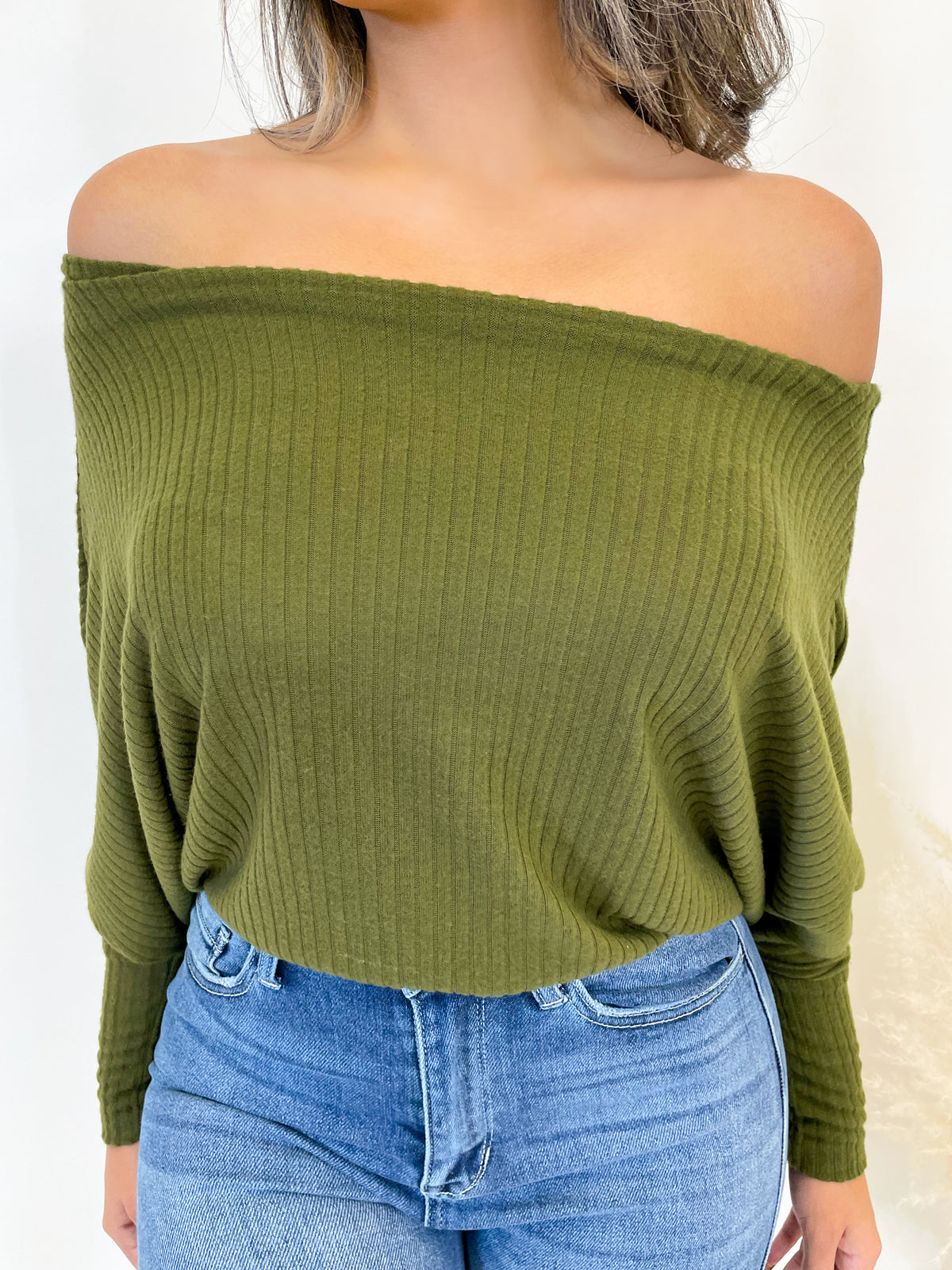  olive long sleeve top, ribbed, high neck, droopy neckline