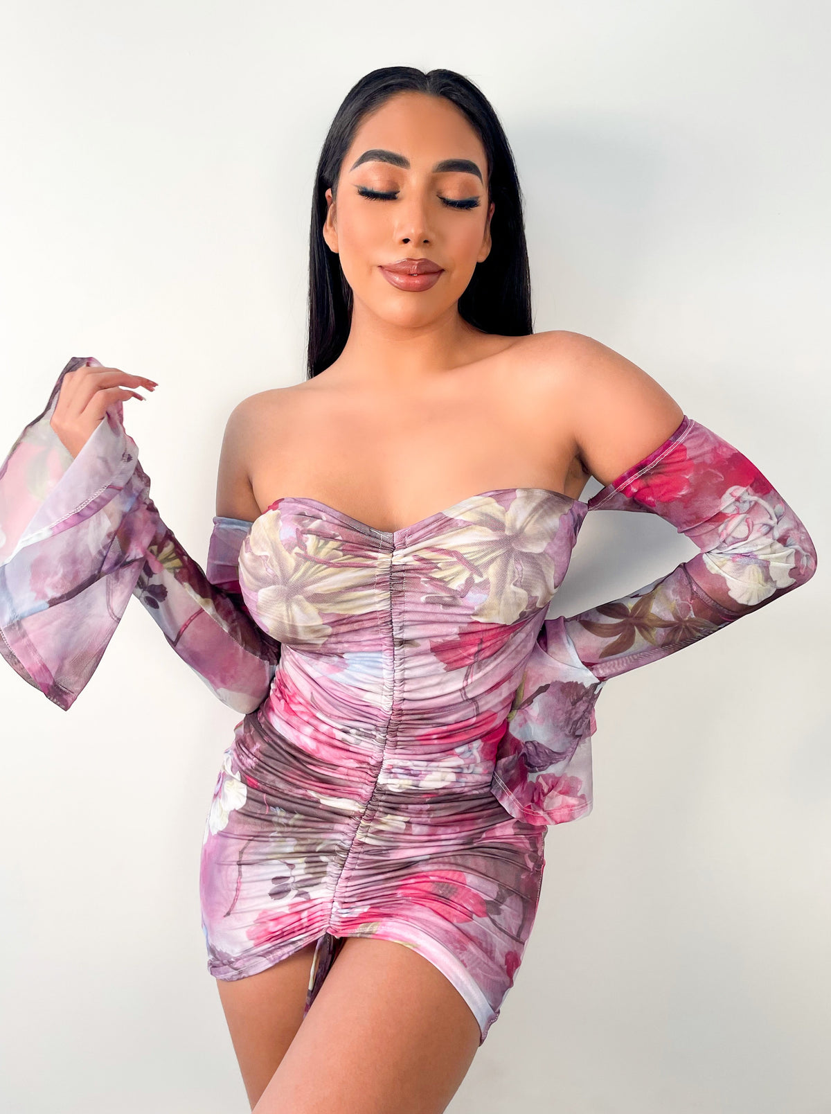 pink multicolor dress, mini dress, off the shoulder, long sleeve, strapless, ruched, middle scrunch, trumpet sleeves, elastic sleeves, bodycon