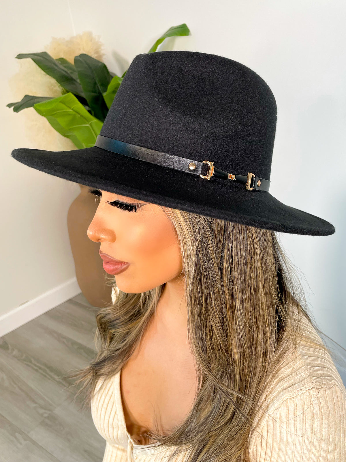 black fedora hat, wide brim, indented top, faux leather strap trim