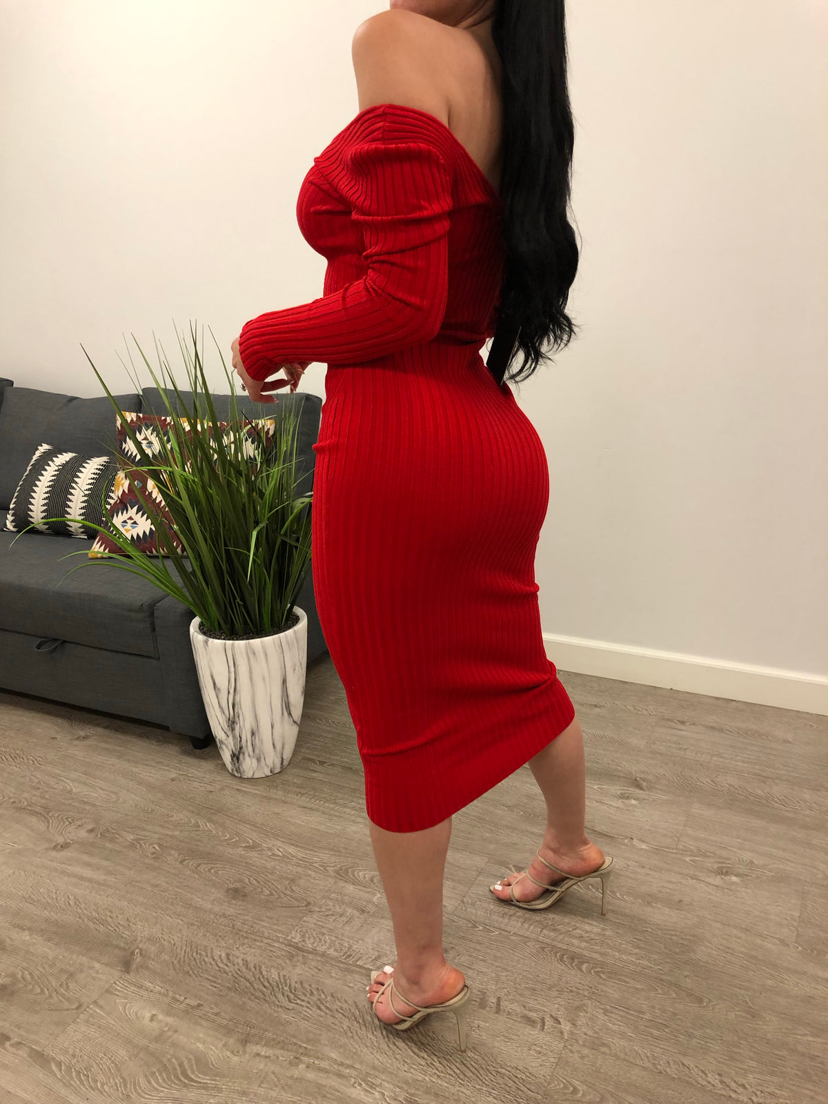 red color long sleeve off the shoulder knit dress. dress shows no cleavage. dress length is just past knees